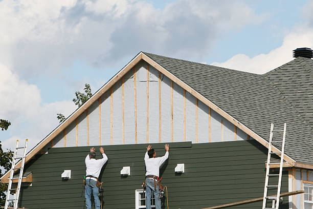 Professional Siding Installation technician working in National Park, NJ